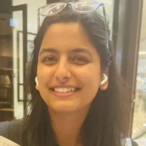 Responsible cleaner from India in a university office