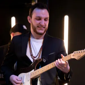 Professeur de guitare (Musicien professionnel)